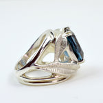 Side view of BANYU Botanical Ring showcasing handcarved leaf design