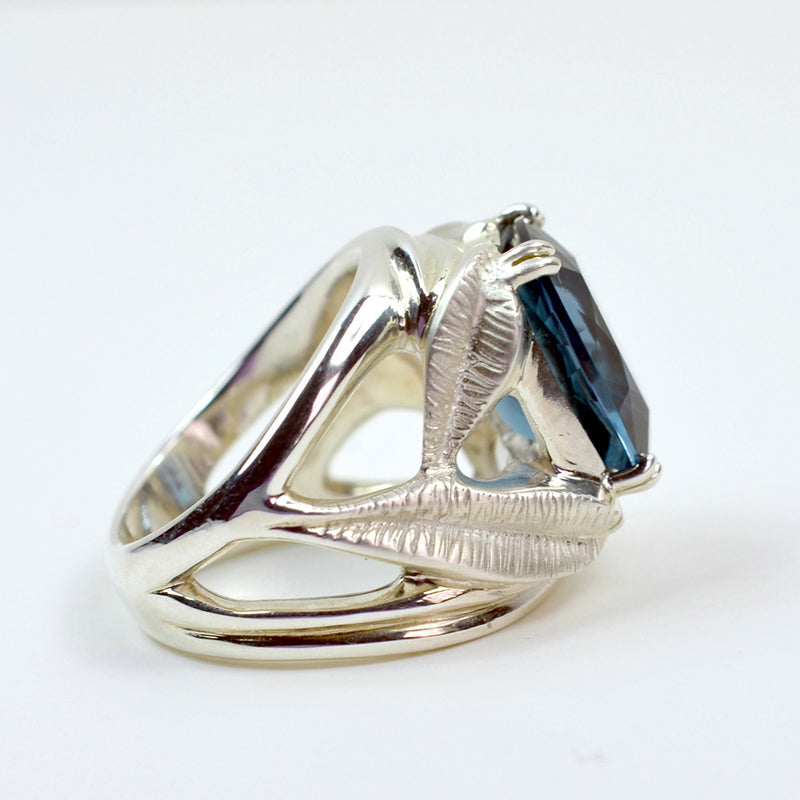 Side view of BANYU Botanical Ring showcasing handcarved leaf design